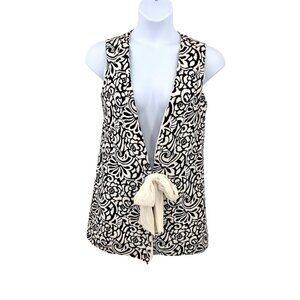 VINTAGE BLACK & OFF WHITE LONG SLEEVELESS VEST W/ BOW FRONT